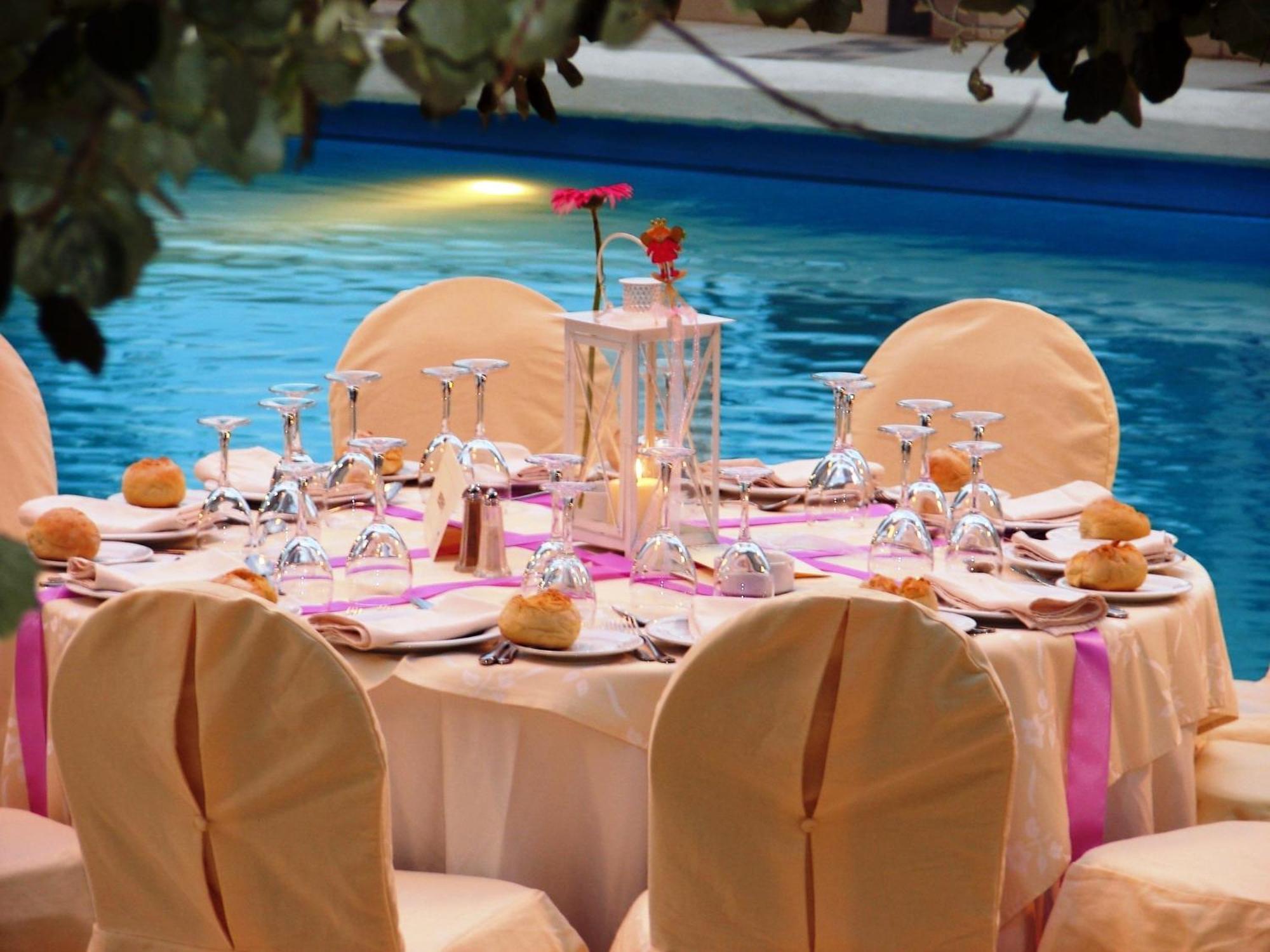 Alexander Beach Hotel & Spa Alexandroupoli Bagian luar foto A table set for a wedding reception